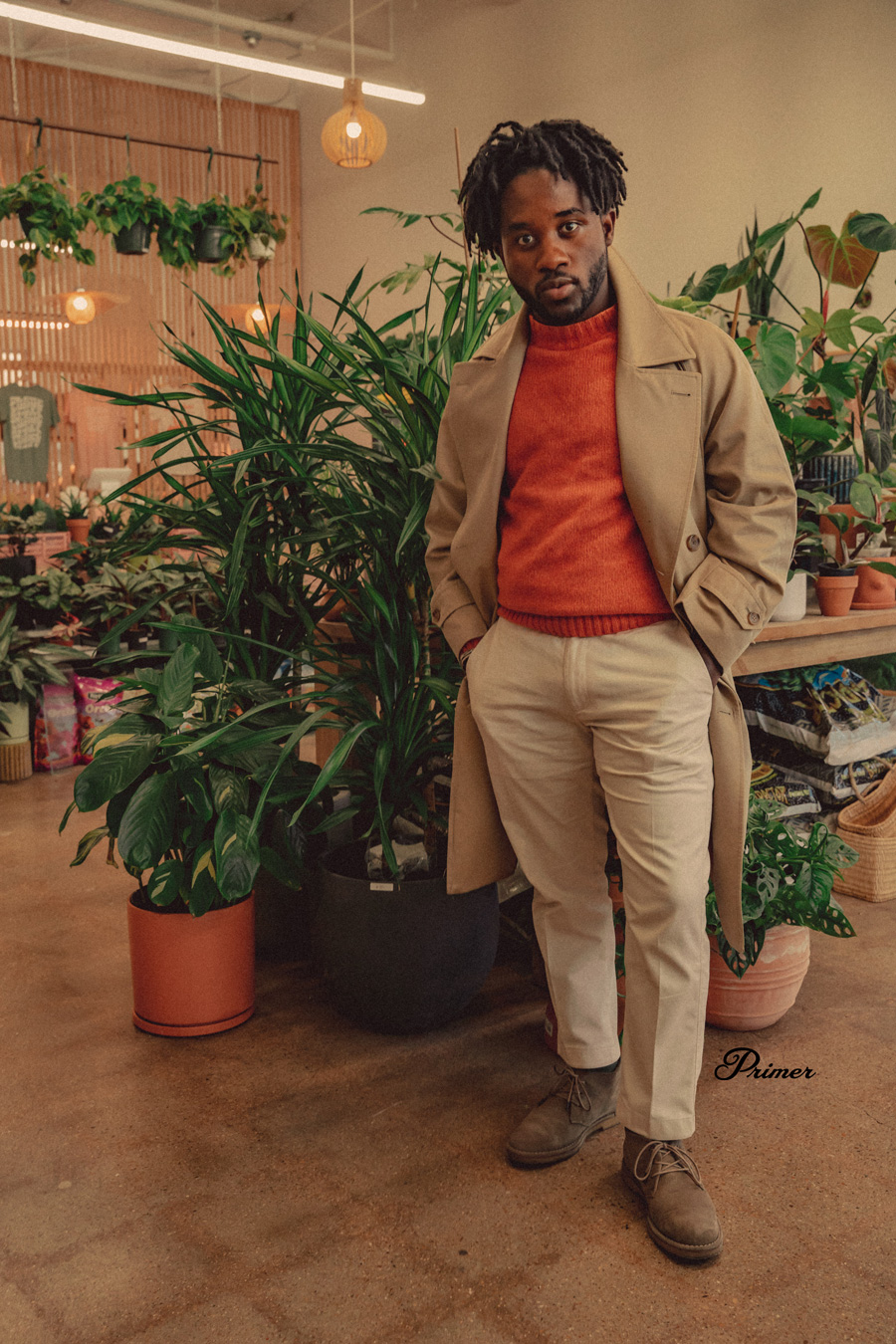 a bright orange sweater with neutrals