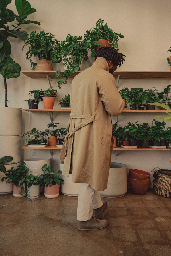 photo of a trench coat belt tied in the back