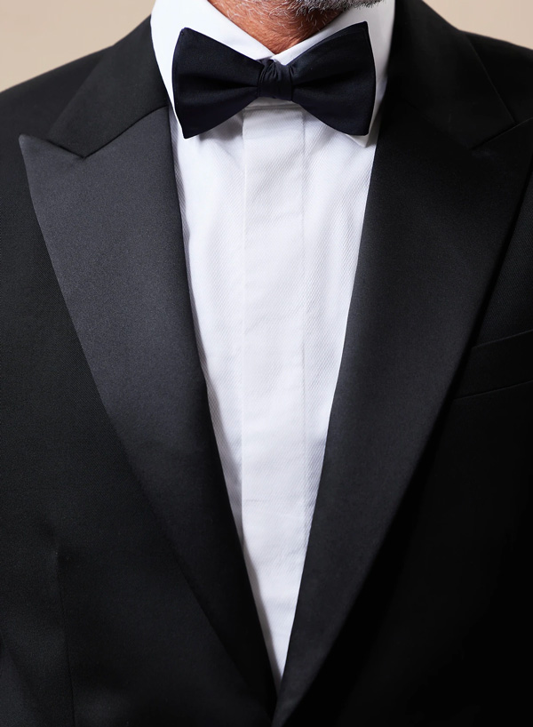 Close up of a covered placket tuxedo shirt without buttons