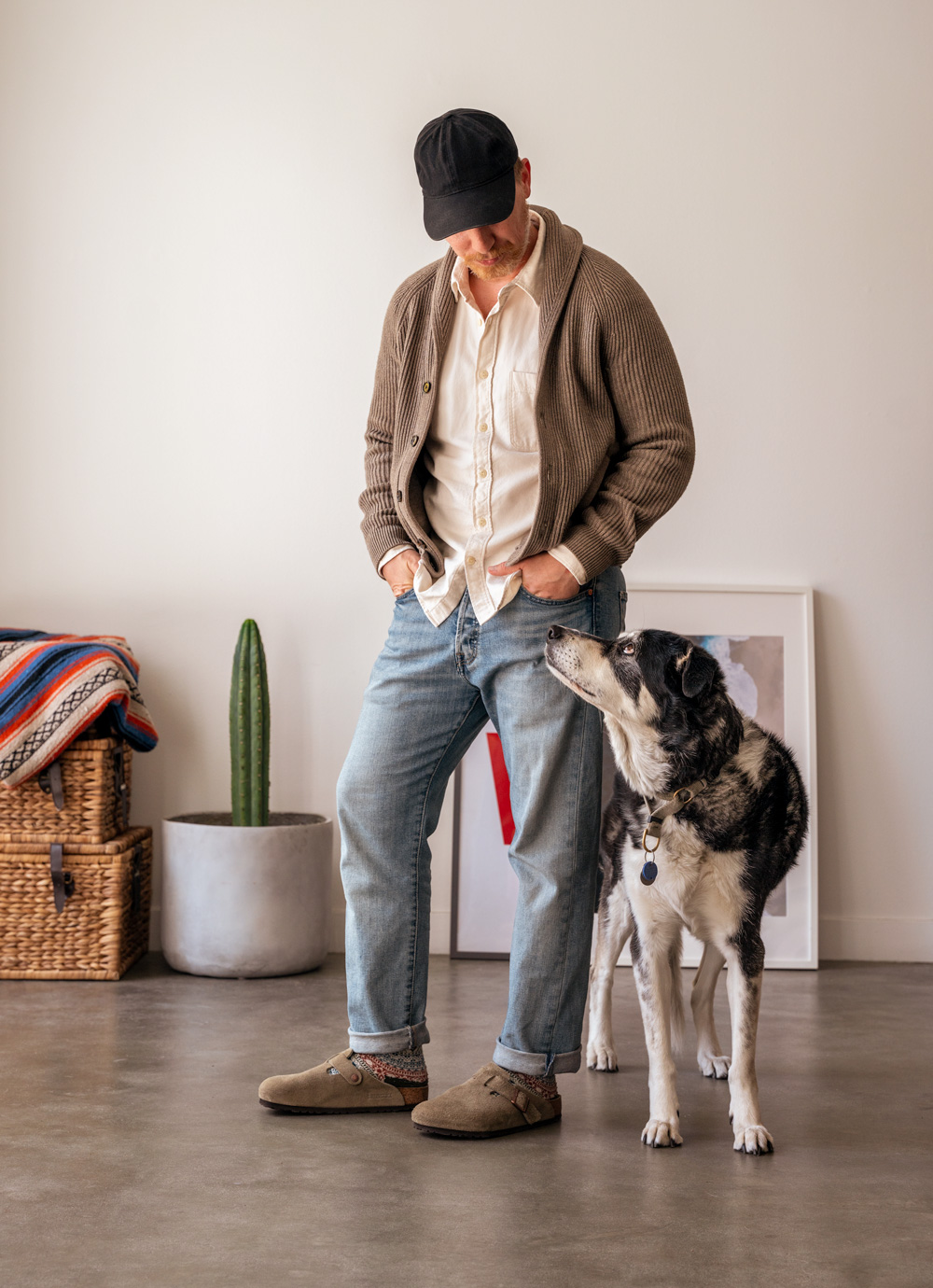 men's casual outfit with shawl collar cardigan, flannel shirt, levi's 501, boot socks, and birkenstock boston