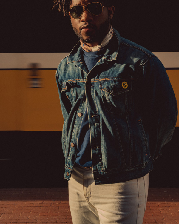 spring style: man wearing denim trucker jacket