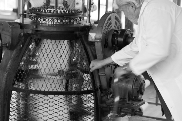 man working a cotton machine