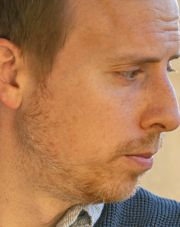 a side profile view of a man's face 