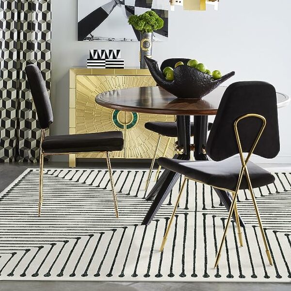 a striped area rug in a living room space