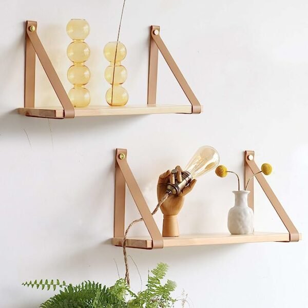 two leather strap style floating shelves