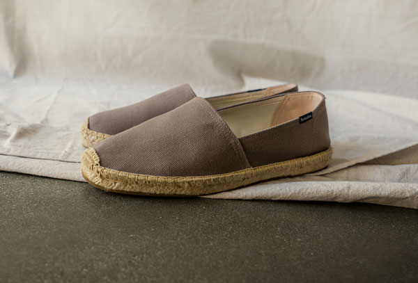 a pair of espadrille shoes