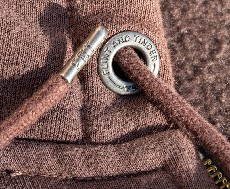 Flint & Tinder 10 Year Hoodie metal aglet and hardware close up