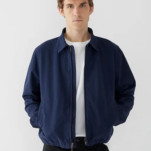 a man wearing a cotton twill harrington jacket
