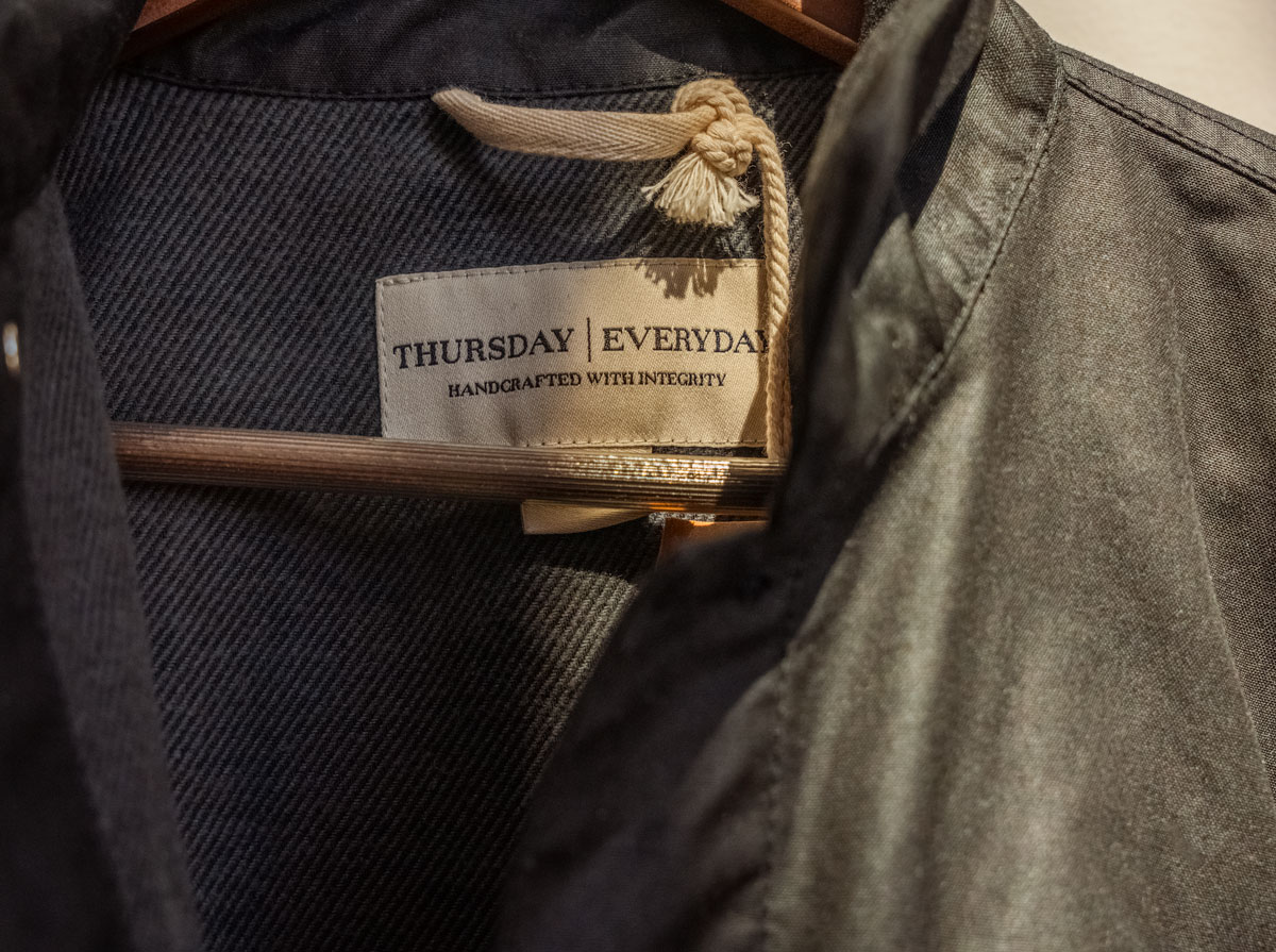 close up of thursday label and waxed canvas