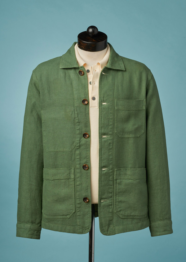 green linen chore coat on mannequin