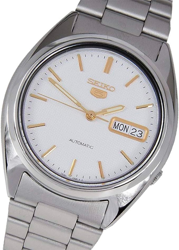 metal seiko watch with gold hands