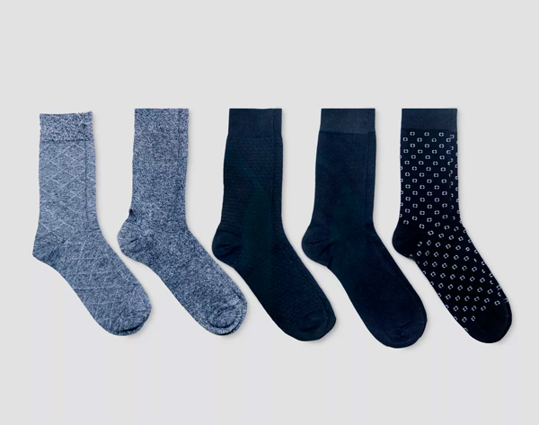 5 pairs of blue socks in varying shades and pattern