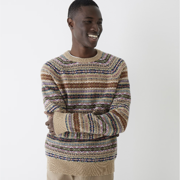 a man wearing a fair isle pattern sweater