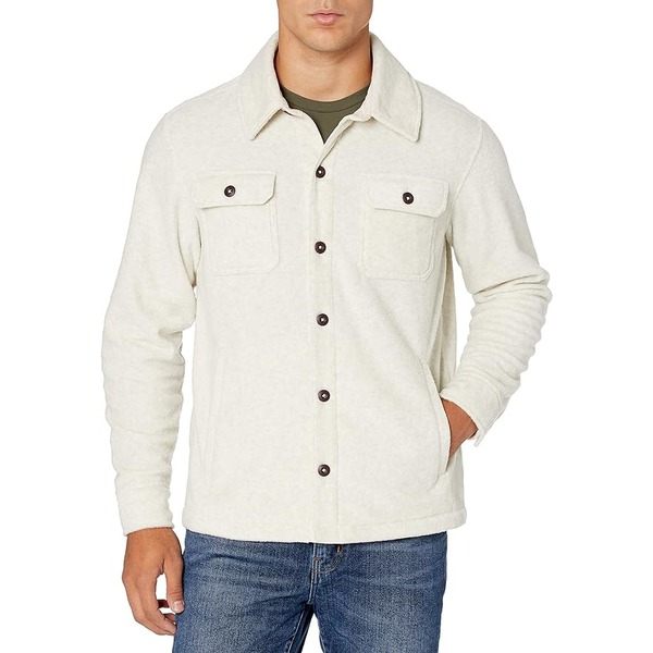 man wearing a fleece shirt jacket and denim jeans