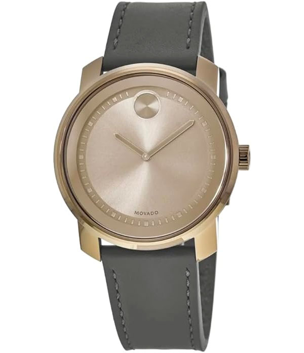 minimalist watch with a bronze face and a gray leather strap