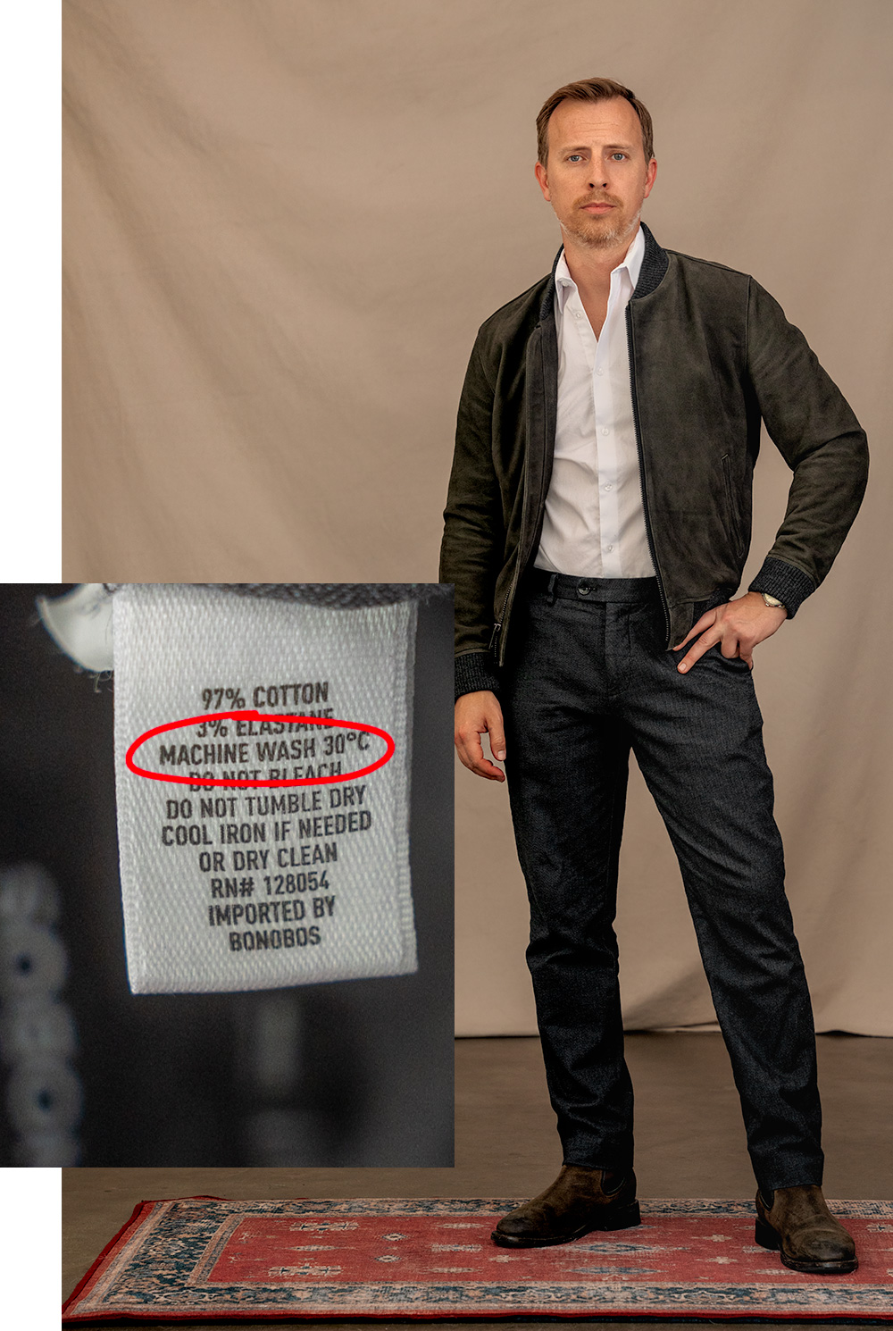 man wearing cotton dress pants next to label with "machine wash" circled