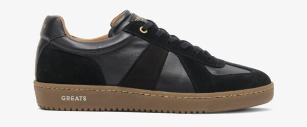 a low top leather upper and gum sole sneaker