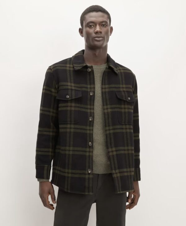 a man wearing a plaid wool oversized shirt jacket