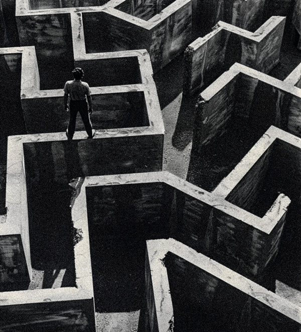a man standing on top of a maze