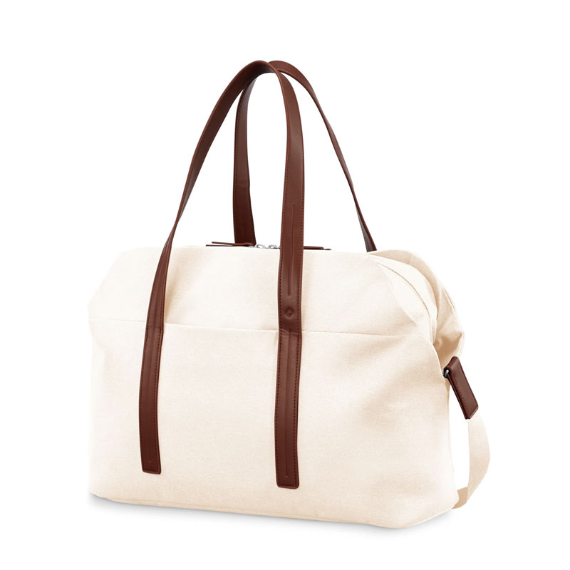 off white canvas bag with leather straps