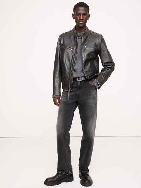 man wearing black straight suits