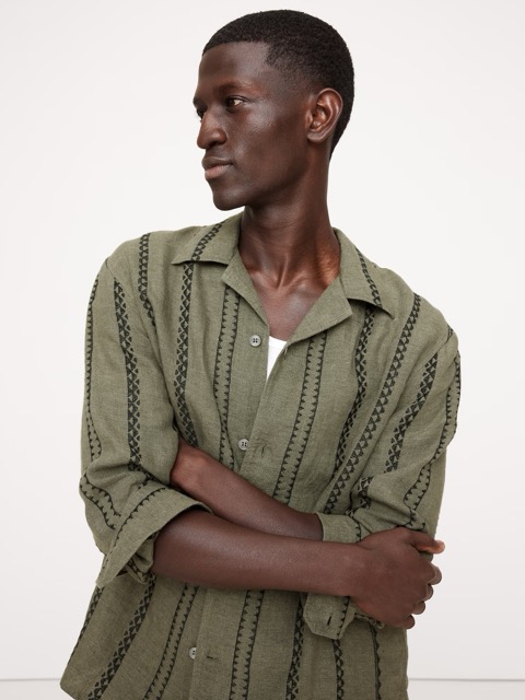 Man in Long Sleeve Green Camp Shirt