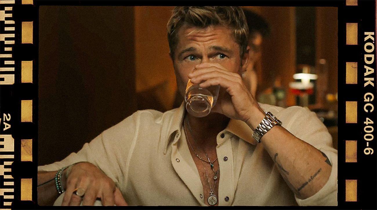 brad pitt wearing jewelry in F1 movie, multiple necklaces, rings, bracelets and watch