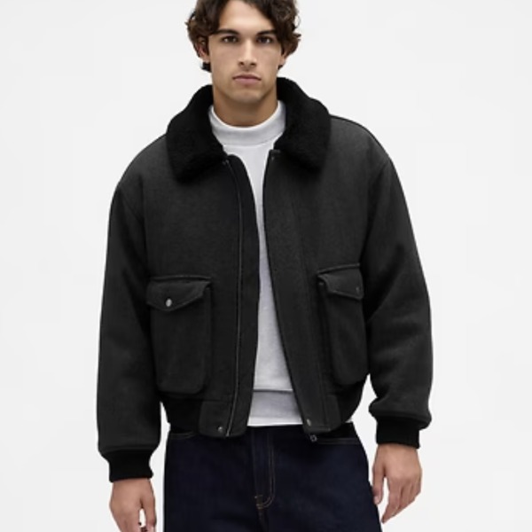 man wearing a bomber style jacket