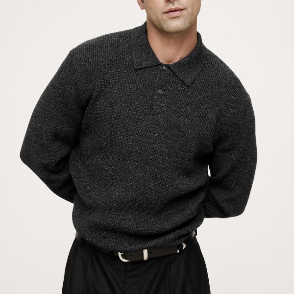 man wearing a waffle knit sweater polo shirt