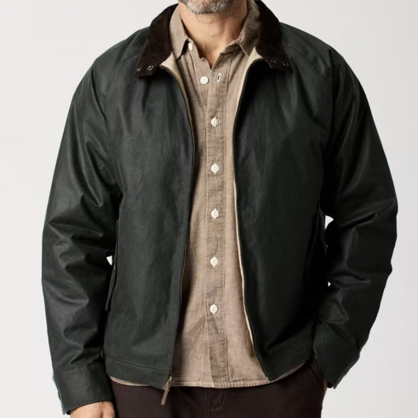 man wearing a waxed Harrington jacket over a button up shirt