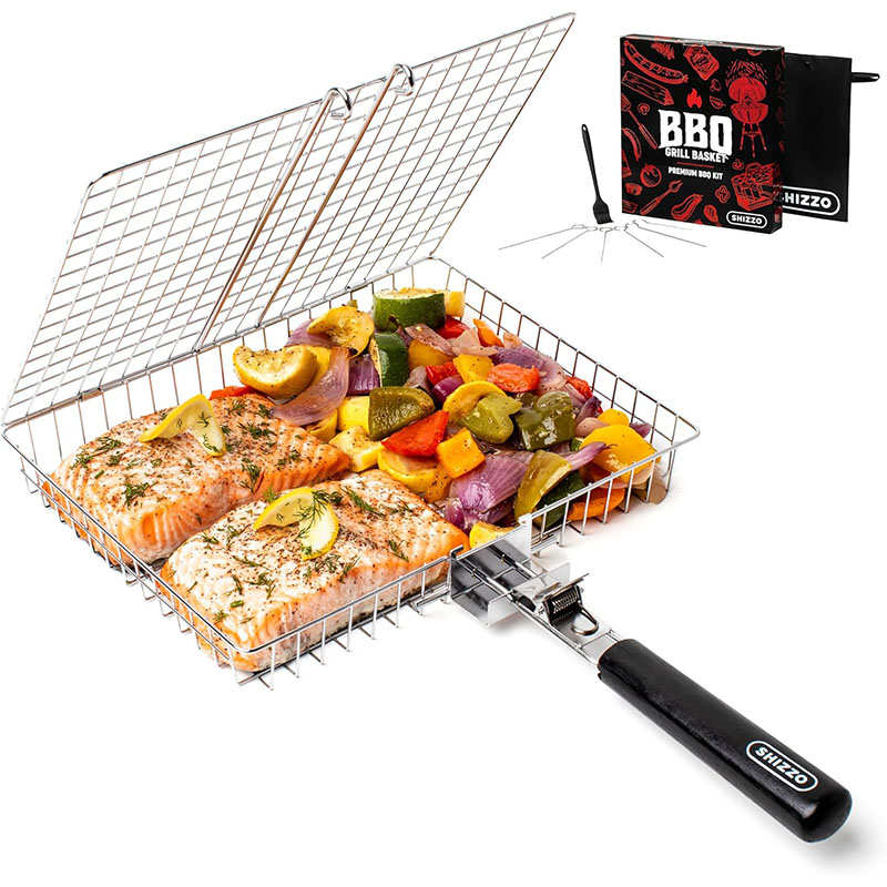a grill basket containing assorted vegetables and meats and a BBQ book set